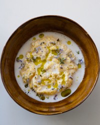 Poached scrambled eggs with goat cheese sauce