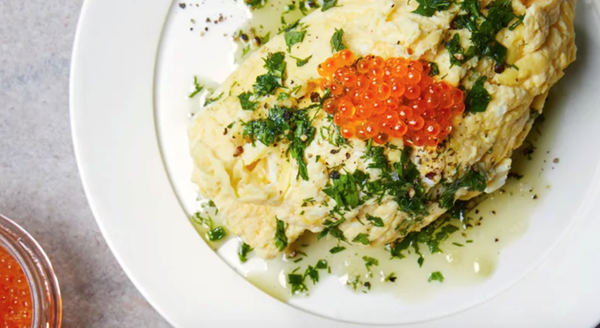 Poached scrambled eggs with herb oil and trout roe