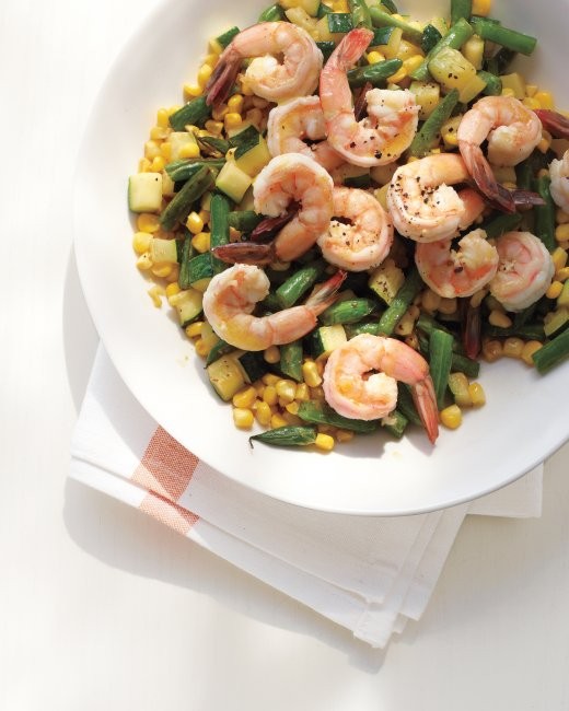 Poached shrimp on succotash