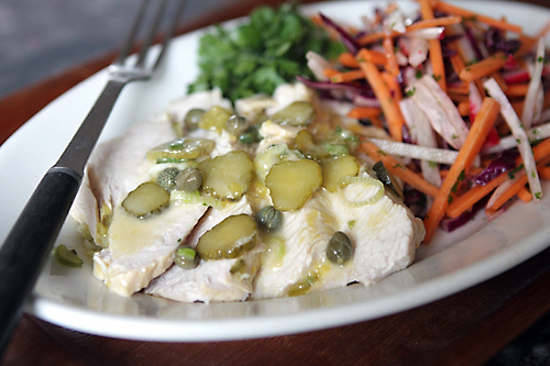 Poached turkey breast salad with lemon, capers, mustard, cornichons, and mint