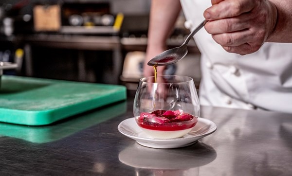 Poached Yorkshire rhubarb with vanilla crème fraîche, blood orange, white chocolate and almond