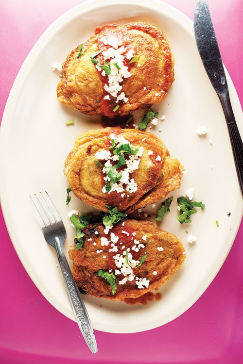 Poblano chiles stuffed with spiced beef (Chiles rellenos con picadillo)