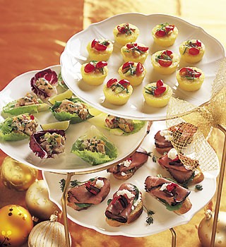 Polenta bites with blue cheese, tomatoes, and pine nuts