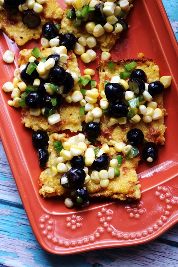 Polenta bites with spicy blueberry jalapeño corn relish