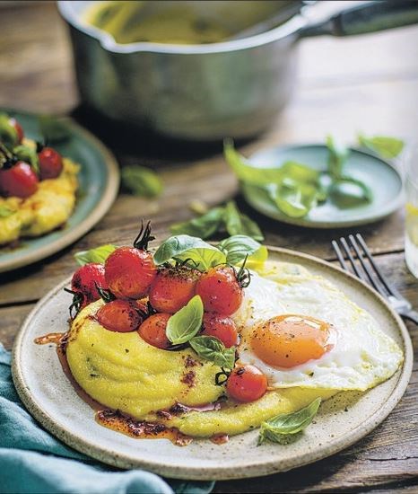 Polenta breakfast bowl with smoky tomatoes & fried eggs
