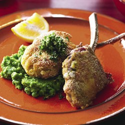 Polenta crusted lamb cutlets with crushed peas and gremolata
