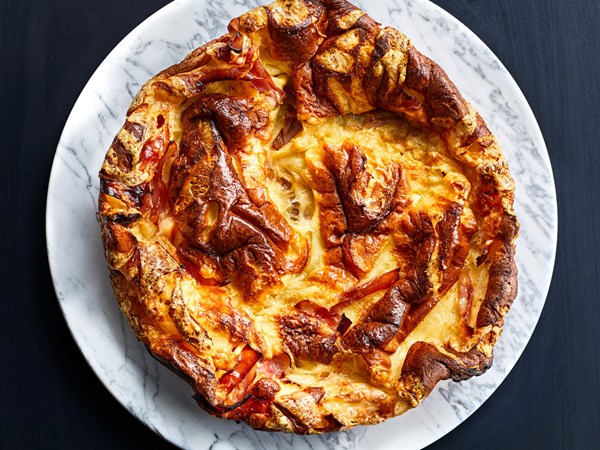 Polenta Dutch baby with ham and Swiss