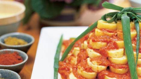 Polenta gnocchi with a rich tomato sauce and fresh herbs