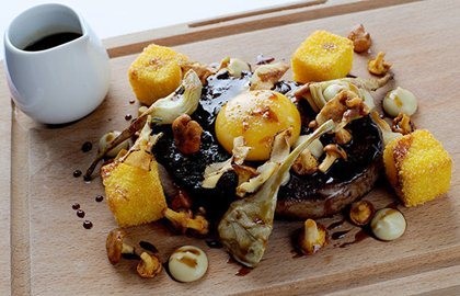 Polenta, rib-eye steak, three artichokes, and smoked yolks