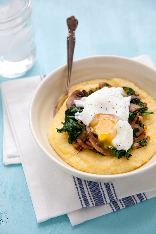 Polenta with mushrooms, kale, caramelized onion and poached egg