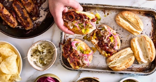 Pomegranate and lemon harissa sticky sausages