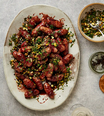Pomegranate and pistachio pigs in blankets