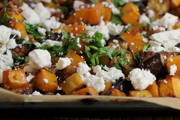 Pomegranate-glazed eggplant with tempeh, butternut squash, and ricotta salata