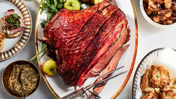 Pomegranate-glazed ham with jammy cipollinis