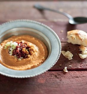 Pomegranate humus with spicy sausage (Sucuklu humus)