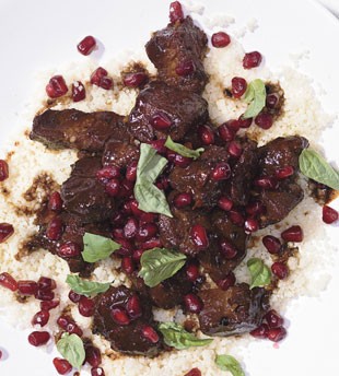 Pomegranate-marinated lamb with spices and couscous
