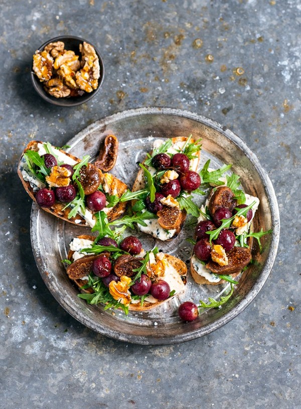 Pomegranate roasted grape and blue cheese bruschetta with salted caramel walnuts