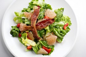 Pomelo, escarole, and candied bacon salad with Meyer lemon dressing