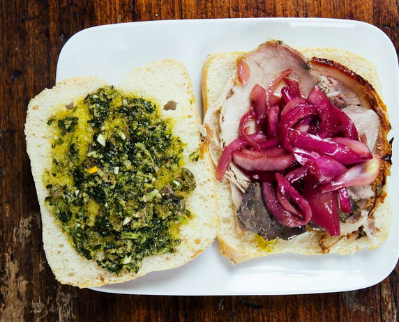 Porchetta sandwiches with marinated onions and salsa verde