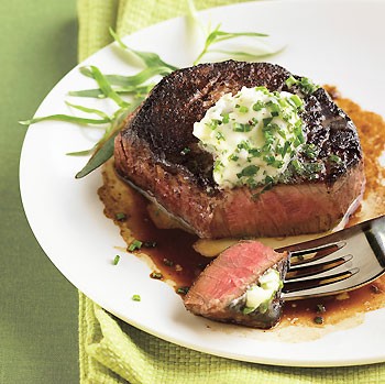 Porcini-crusted filet mignon with fresh herb butter