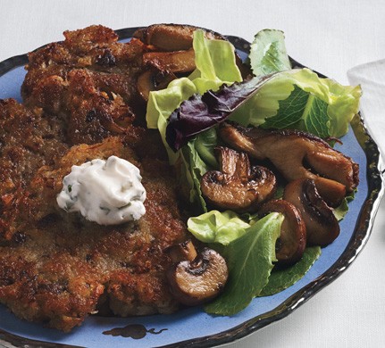 Porcini mushroom latkes with mushroom salad and chive "cream"