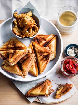 Pork and bean jaffles with pickled jalapeños and spiced scratchings
