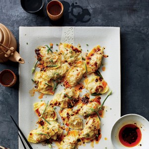 Pork and chive dumplings with red chile oil