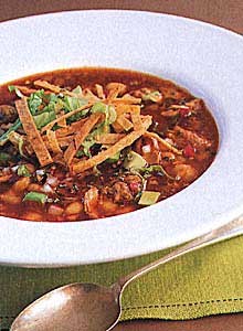 Pork and hominy stew with red chiles (Pozole rojo)