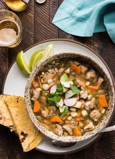 Pork and hominy stew with roasted Anaheim chiles