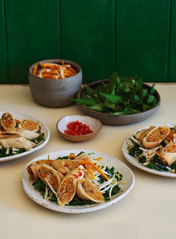 Pork and pumpkin spring rolls with kale vermicelli salad and pickle
