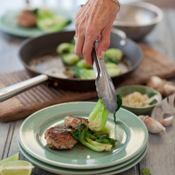 Pork and water chestnut burgers with sesame bok choy