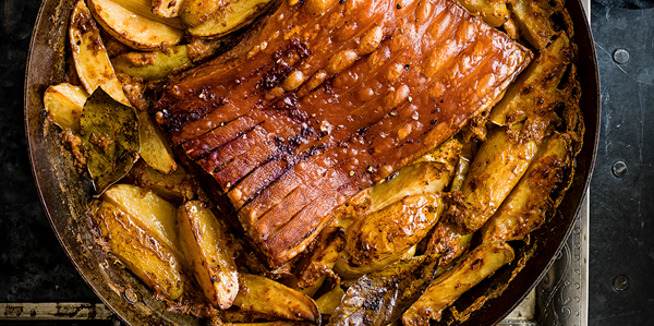 Pork belly and potatoes baked in milk, bay and smoked paprika