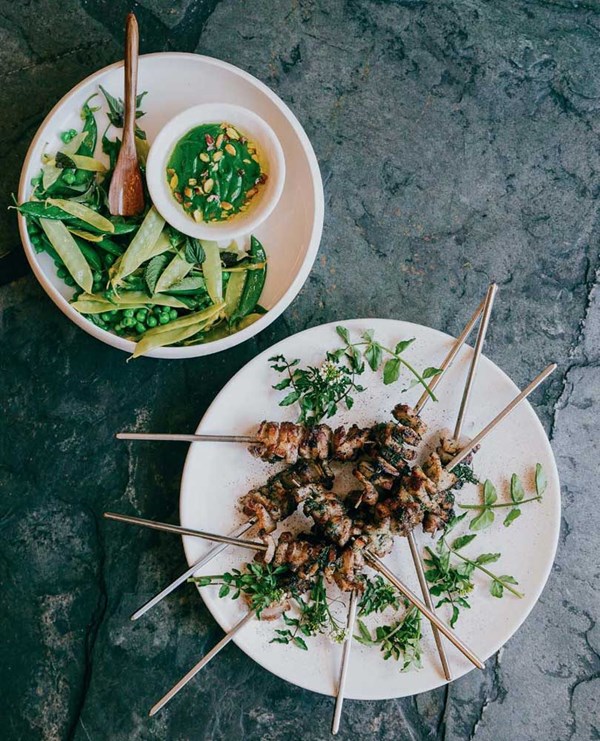 Pork belly skewers with sugar snaps & watercress sauce