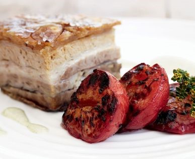 Pork belly with liquorice soubise (Crispy belly pork with thyme roast plums and liquorice soubise)