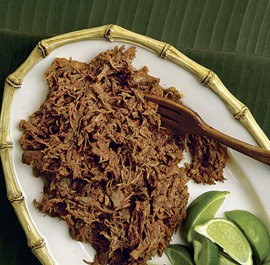 Pork braised in banana leaves with manchamantel sauce