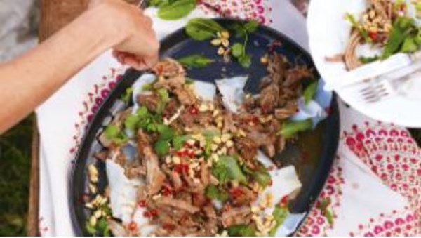 Pork braised in spice coconut water with rice noodles