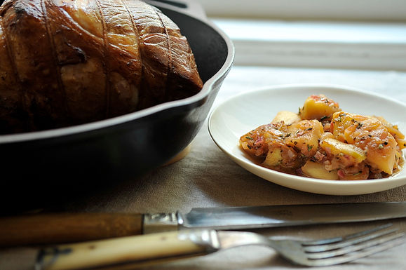 Pork brined in rum and cider with apples