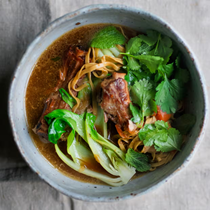 Pork broth with noodles and greens