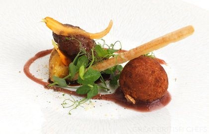 Pork cheek with crispy ham hock bon bon, crushed swede and mustard apple compote
