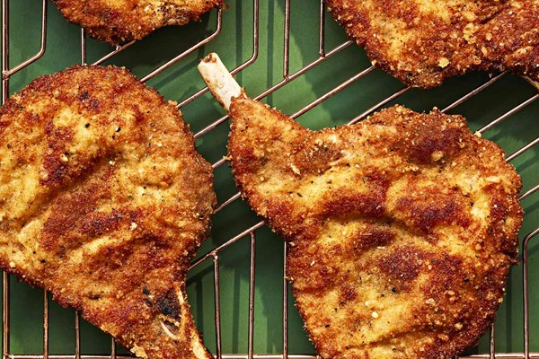 Pork chop Milanese with arugula salad