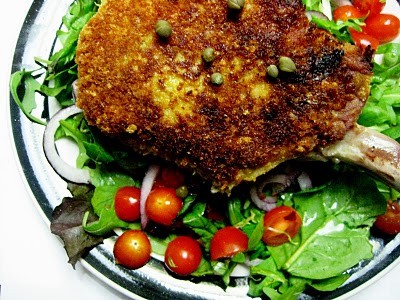Pork chop Milanese with arugula salad