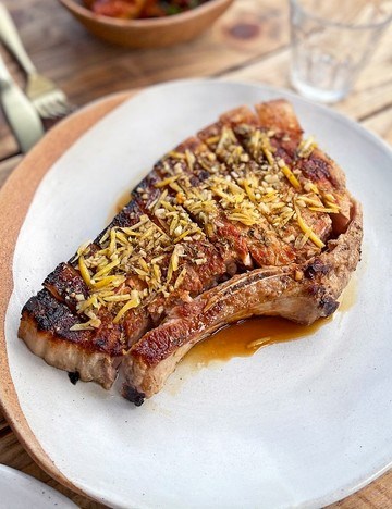 Pork chop with lemon salsa