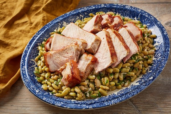 Pork chops and flageolet beans with a pork fat and sherry vinegar dressing