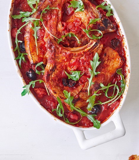 Pork chops baked in chorizo and black olive tomato sauce