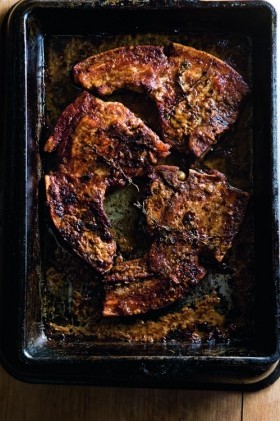 Pork chops baked with stout and mustard