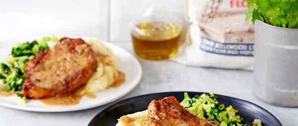 Pork chops in cider and juniper with creamy mash