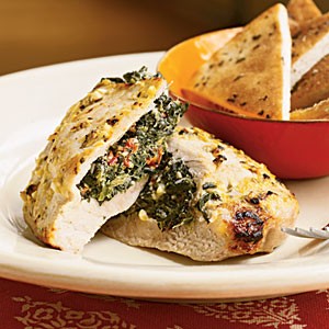 Pork chops stuffed with feta and spinach