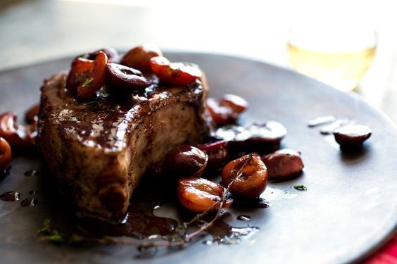 Pork chops with brandied cherries