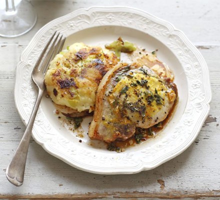 Pork chops with bubble 'n' leek cakes