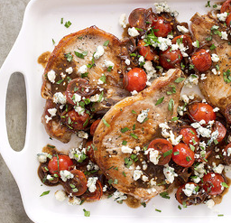 Pork chops with cherry tomatoes and balsamic reduction